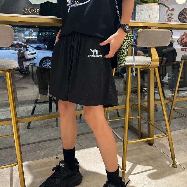 领航骆驼 舒适速干中腰宽松网眼透气百搭轻便舒适设计感休闲短裤 男女同款 黑