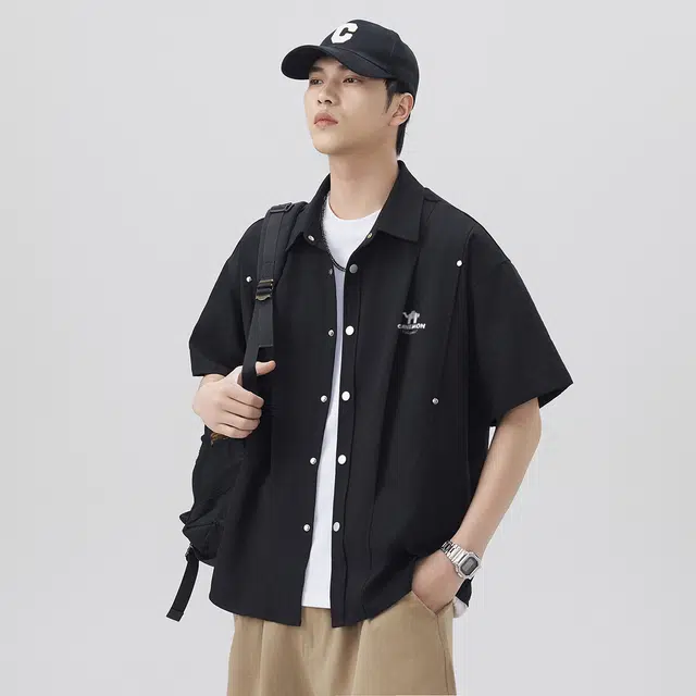 领航骆驼 嘻哈街头美式时尚翻领痞帅复古潮牌凉感透气薄款宽松休闲百搭轻商务通勤落肩短袖   衬衫  男女同款