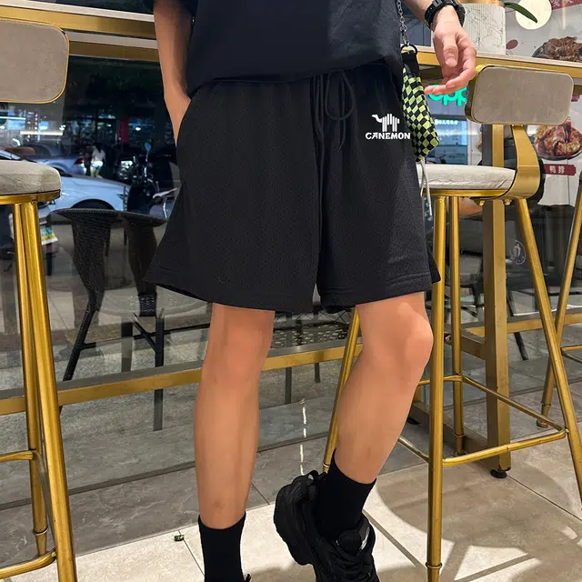 领航骆驼 舒适速干中腰宽松网眼透气百搭轻便舒适设计感休闲短裤 男女同款 黑