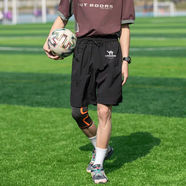 领航骆驼 字母中腰系带透气百搭直筒休闲短裤 男女同款