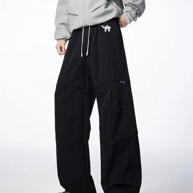 领航骆驼 美式高街纯色基础款舒适时尚简约褶皱拼接设计休闲牛仔裤 男女同款