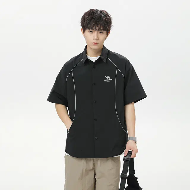 领航骆驼 无性别主义潮牌高街风基础线条解构设计感纯色日常通勤宽松休闲百搭轻薄舒适透气插肩款小众短袖  衬衫 男女同款