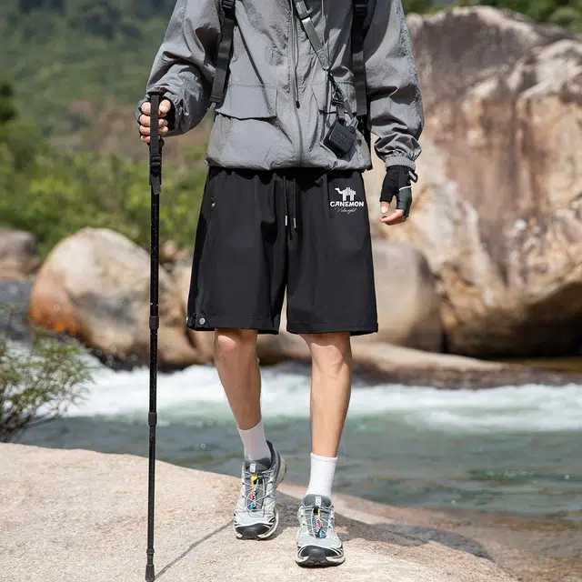 领航骆驼 美式速干透气纯色户外运动直筒休闲短裤 男女同款