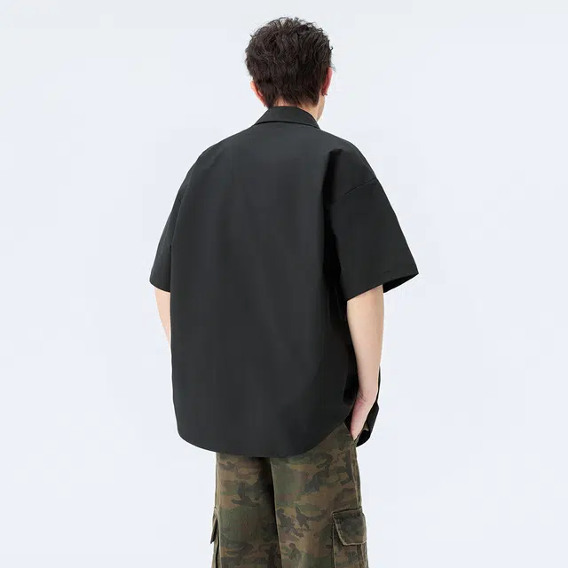领航骆驼  无性别主义简约美式时尚潮牌翻领宽松薄款纯色多口袋工装风舒适休闲百搭短袖   衬衫 男女同款