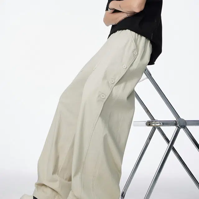 领航骆驼 美式复古纽扣拼接设计潮流百搭休闲牛仔裤 男女同款