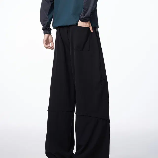 领航骆驼 美式高街纯色基础款舒适时尚简约褶皱拼接设计休闲牛仔裤 男女同款