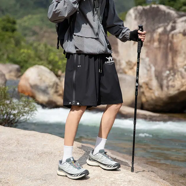 领航骆驼 美式速干透气纯色户外运动直筒休闲短裤 男女同款