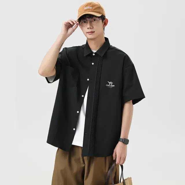 领航骆驼 时尚街头纯色简约印花基础款潮流百搭透气垂感翻领短袖衬衫  男女同款