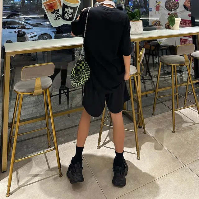 领航骆驼 舒适速干中腰宽松网眼透气百搭轻便舒适设计感休闲短裤 男女同款 黑