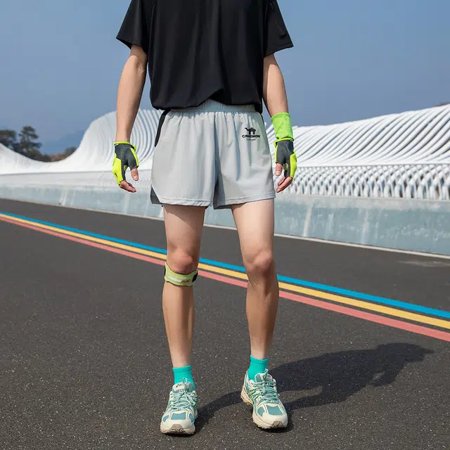 领航骆驼 薄款舒适百搭速干跑步健身简约休闲短裤 男女同款