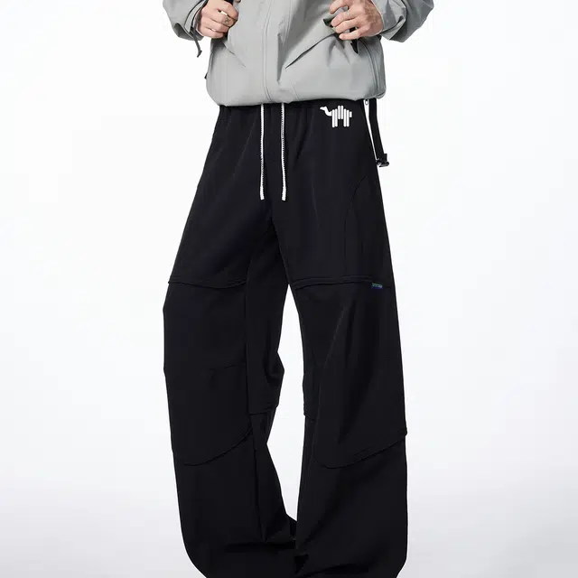 领航骆驼 美式高街纯色基础款舒适时尚简约褶皱拼接设计休闲牛仔裤 男女同款