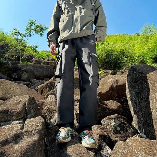 领航骆驼 轻量化特氟龙软壳三防机能防水山系户外运动百搭登山直筒   工装裤 男女同款