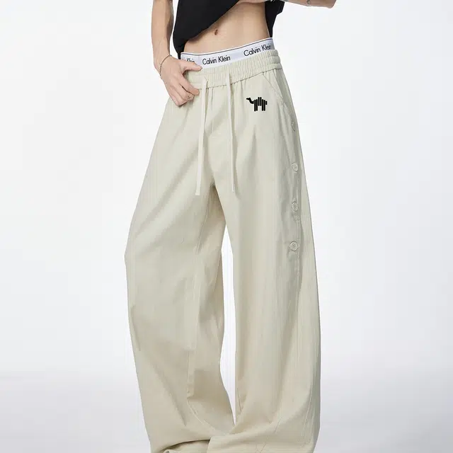 领航骆驼 美式复古纽扣拼接设计潮流百搭休闲牛仔裤 男女同款