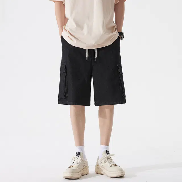 领航骆驼 工装多口袋微弹高街潮流水洗做旧宽松舒适纯色户外通勤百搭休闲牛仔短裤 男女同款