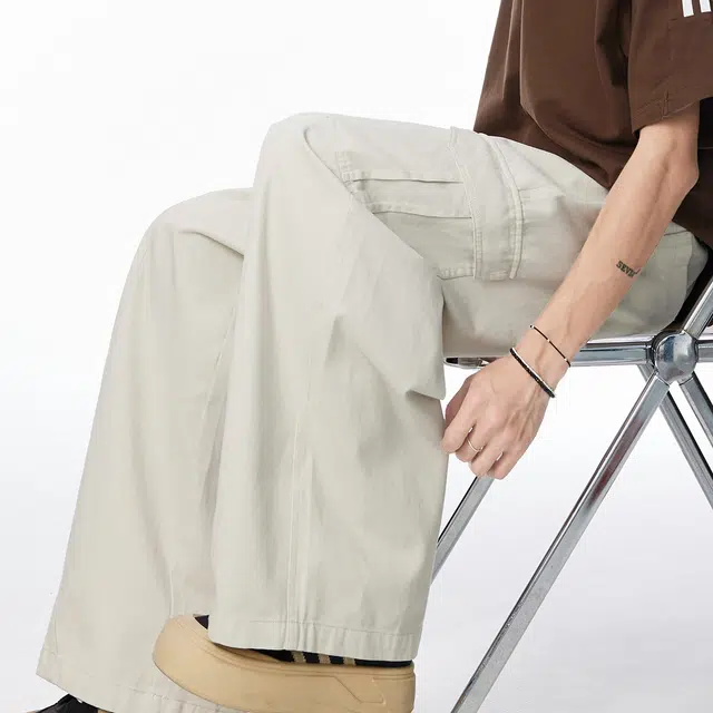 领航骆驼 美式拼接户外百搭直筒系带休闲牛仔裤 男女同款