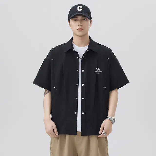 领航骆驼 嘻哈街头美式时尚翻领痞帅复古潮牌凉感透气薄款宽松休闲百搭轻商务通勤落肩短袖   衬衫  男女同款