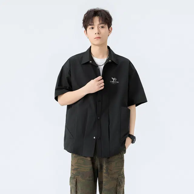 领航骆驼  无性别主义简约美式时尚潮牌翻领宽松薄款纯色多口袋工装风舒适休闲百搭短袖   衬衫 男女同款