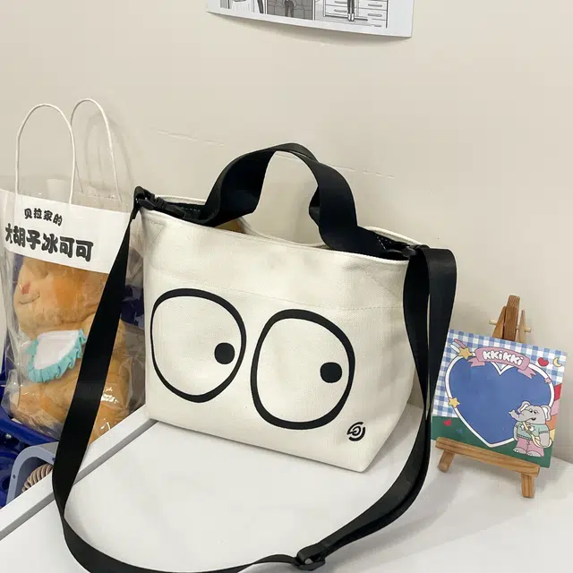 伊曼家 小众设计简约轻便休闲风通勤 帆布 帆布包手提包 女款 大眼睛/波点