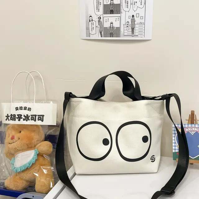 伊曼家 小众设计简约轻便休闲风通勤 帆布 帆布包手提包 女款 大眼睛/波点