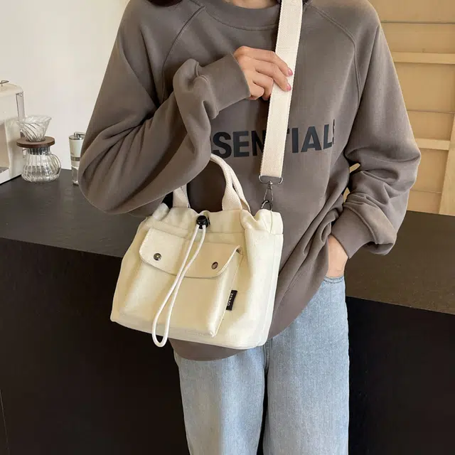 伊曼家 运动风潮流帅气简约时尚小众轻便包包 帆布 帆布包单肩包 女款