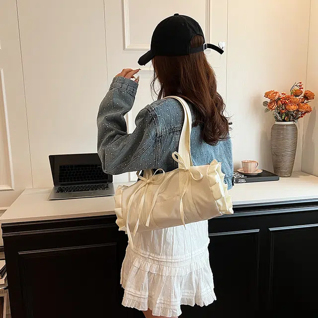 伊曼家 甜美少女蝴蝶结帆布包包 腋下包休闲通勤包小众法棍包 帆布 单肩包 女款 米白色/蓝色/黑色