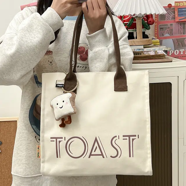 伊曼家 包包时尚休闲托特包印花字母潮流大容量 尼龙布 单肩包 女款 白色/卡其色/黑色