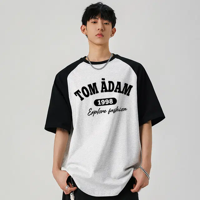 TOM ADAM T