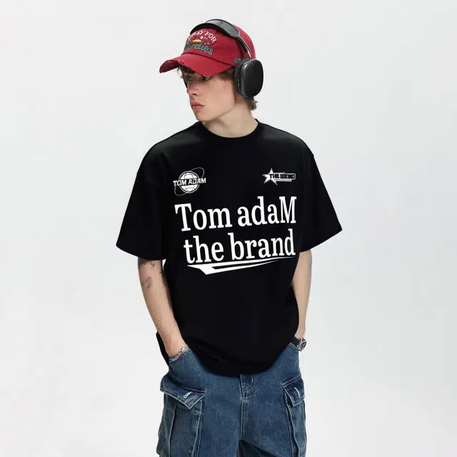 TOM ADAM T