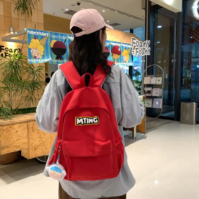 草丛喵喵喵 日系纯色休闲通勤旅行轻便高颜值大容量背包初中高中大学上课 尼龙 双肩包 男女同款情侣款 黑色/红色/灰色/黄色