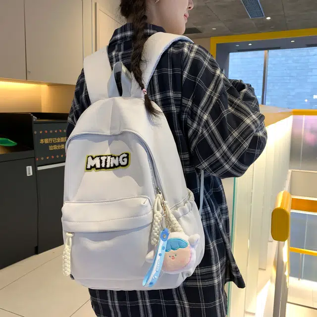 草丛喵喵喵 日系纯色休闲通勤旅行轻便高颜值大容量背包初中高中大学上课 尼龙 双肩包 男女同款情侣款 黑色/红色/灰色/黄色