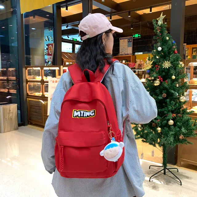 草丛喵喵喵 日系纯色休闲通勤旅行轻便高颜值大容量背包初中高中大学上课 尼龙 双肩包 男女同款情侣款 黑色/红色/灰色/黄色