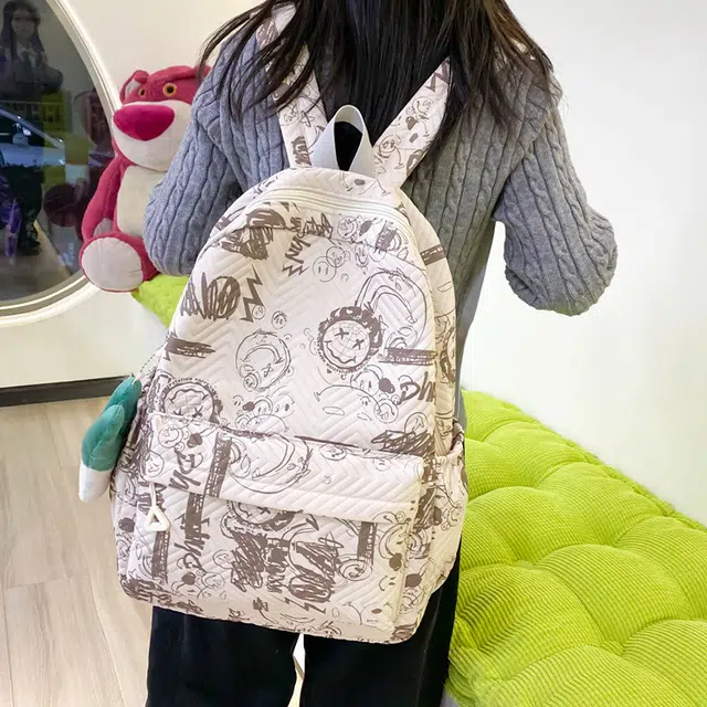 草丛喵喵喵 涂鸦漫画潮酷时尚潮流初高中生出行通勤大容量 尼龙 双肩包 常规 男女同款情侣款 黑配白/白配黑/白配棕/黑配蓝/蓝配白