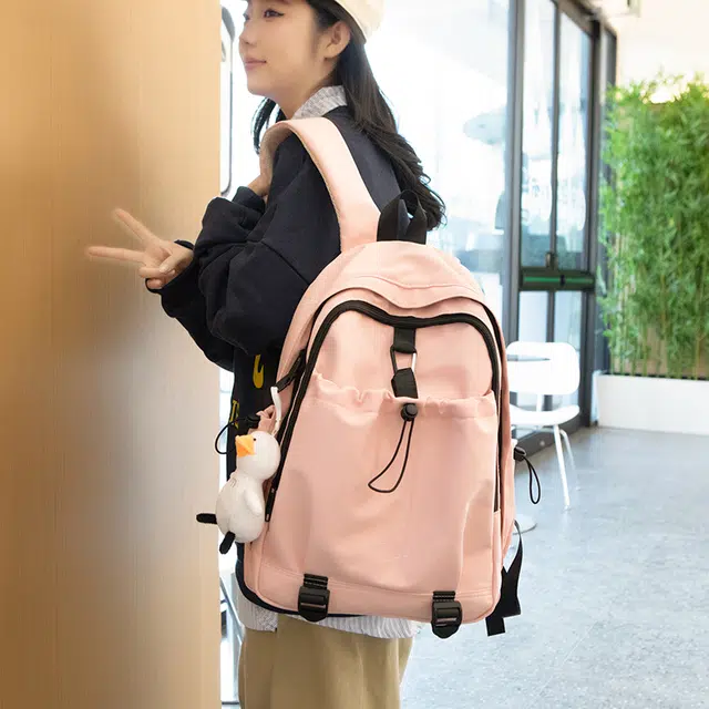 草丛喵喵喵 学院风日常休闲时尚潮流通勤大容量 男女情侣同款 初高中生背包 大学生书包 常规 尼龙双肩包 多色