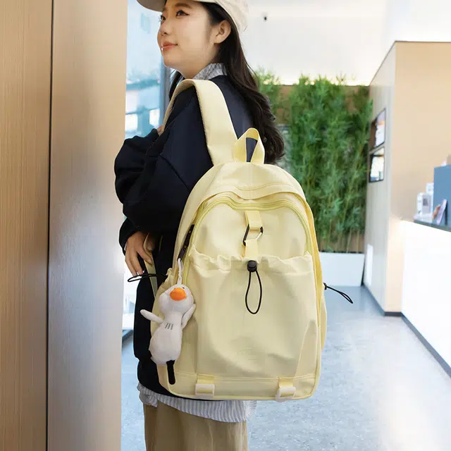 草丛喵喵喵 学院风日常休闲时尚潮流通勤大容量 男女情侣同款 初高中生背包 大学生书包 常规 尼龙双肩包 多色