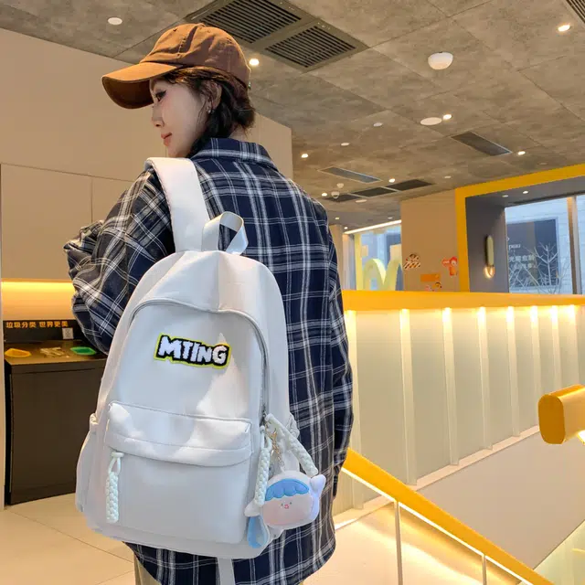 草丛喵喵喵 日系纯色休闲通勤旅行轻便高颜值大容量背包初中高中大学上课 尼龙 双肩包 男女同款情侣款 黑色/红色/灰色/黄色