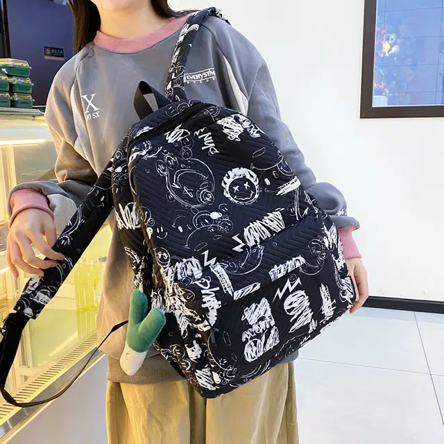 草丛喵喵喵 涂鸦漫画潮酷时尚潮流初高中生出行通勤大容量 尼龙 双肩包 常规 男女同款情侣款 黑配白/白配黑/白配棕/黑配蓝/蓝配白