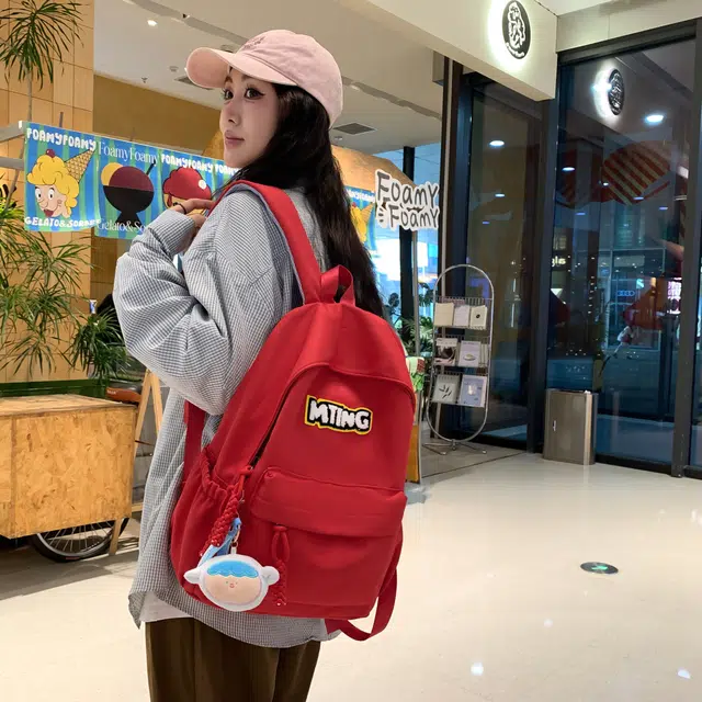 草丛喵喵喵 日系纯色休闲通勤旅行轻便高颜值大容量背包初中高中大学上课 尼龙 双肩包 男女同款情侣款 黑色/红色/灰色/黄色