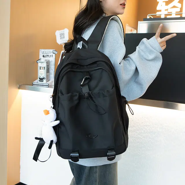 草丛喵喵喵 学院风日常休闲时尚潮流通勤大容量 男女情侣同款 初高中生背包 大学生书包 常规 尼龙双肩包 多色