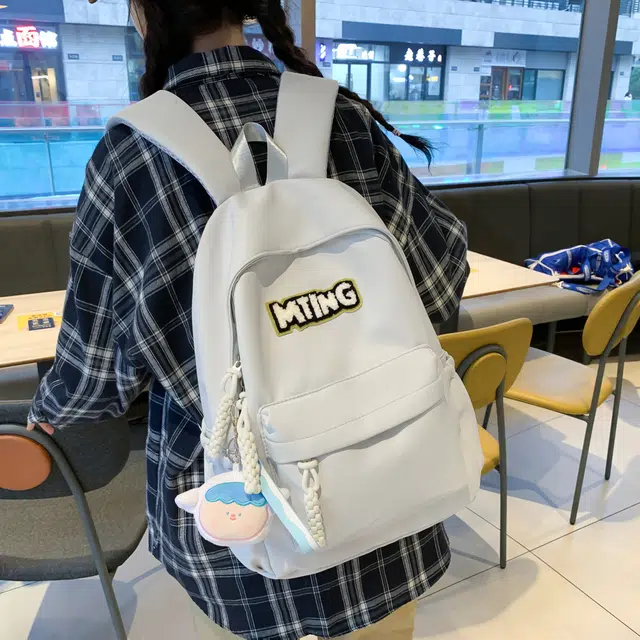 草丛喵喵喵 日系纯色休闲通勤旅行轻便高颜值大容量背包初中高中大学上课 尼龙 双肩包 男女同款情侣款 黑色/红色/灰色/黄色