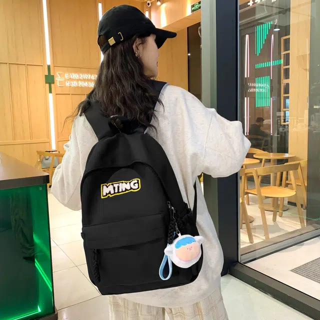 草丛喵喵喵 日系纯色休闲通勤旅行轻便高颜值大容量背包初中高中大学上课 尼龙 双肩包 男女同款情侣款 黑色/红色/灰色/黄色