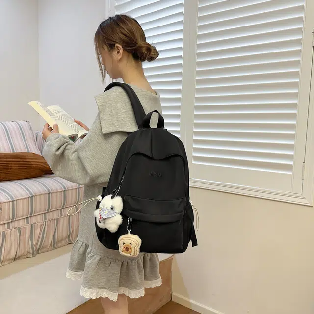 草丛喵喵喵 潮流纯色高颜值简约轻便 尼龙 双肩包 女款 米白色/黑色/粉红色/黄色/浅蓝色