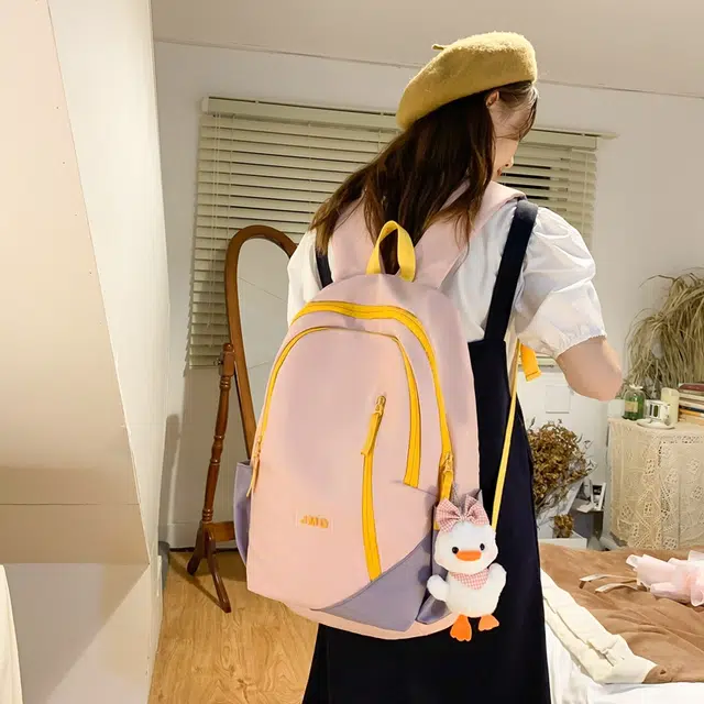 草丛喵喵喵 撞色轻便简约 尼龙 双肩包 男女同款情侣款 米白色/黑色/粉色/蓝色