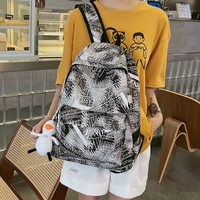 芭菲尼 小众涂鸦设计休闲简约日常通勤时尚百搭 尼龙 双肩包 常规 男女同款情侣款 灰色/桔色/粉红/蓝色