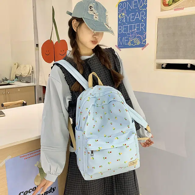 芭菲尼 轻便时尚简约百搭潮流碎花背包 帆布 帆布包双肩包 常规 男女同款情侣款 浅蓝色碎花/蓝色碎花