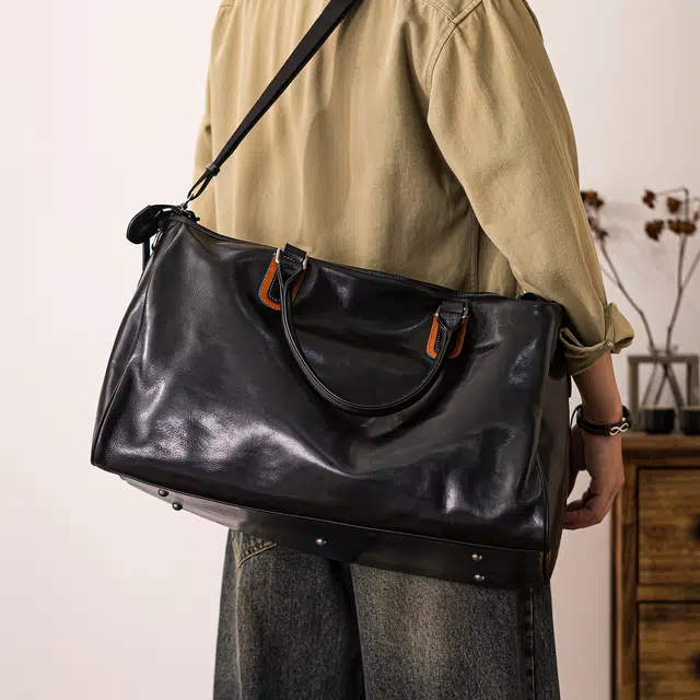 后步 小众百搭简约通勤大容量个性 头层牛皮 旅行包 男女同款情侣款 黑色
