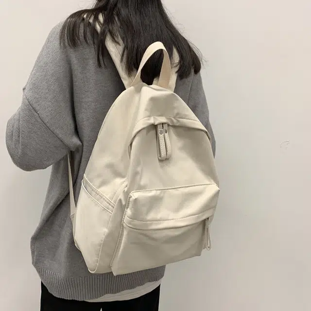 艾妮兔 日系简约百搭初高中大学生休闲通勤 帆布 书包帆布包双肩包 男女同款情侣款 米白色/卡其色/蓝色/黑色