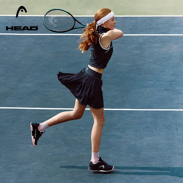 HEAD on court woman