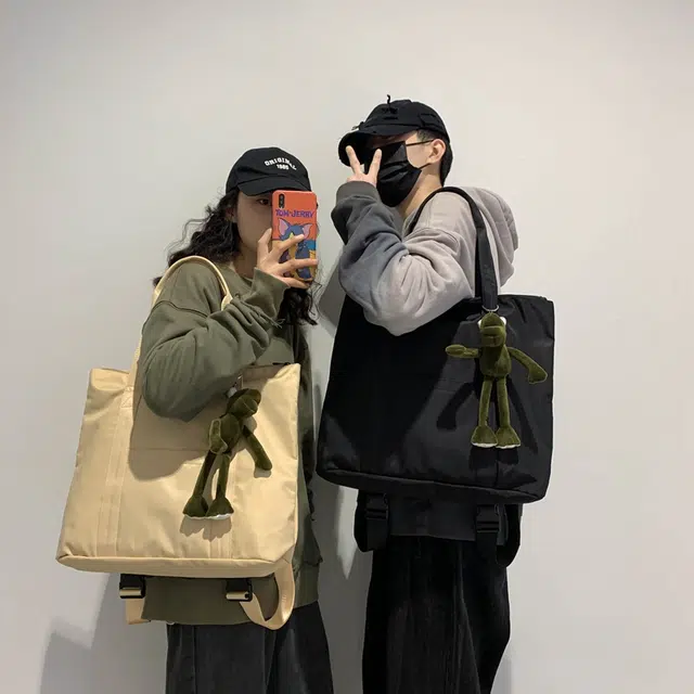 班亚奴 时尚复古潮流小众设计感多功能三用百搭出行旅游轻便大容量 尼龙 双肩包手提包单肩包 男女同款情侣款 黑色/蓝色