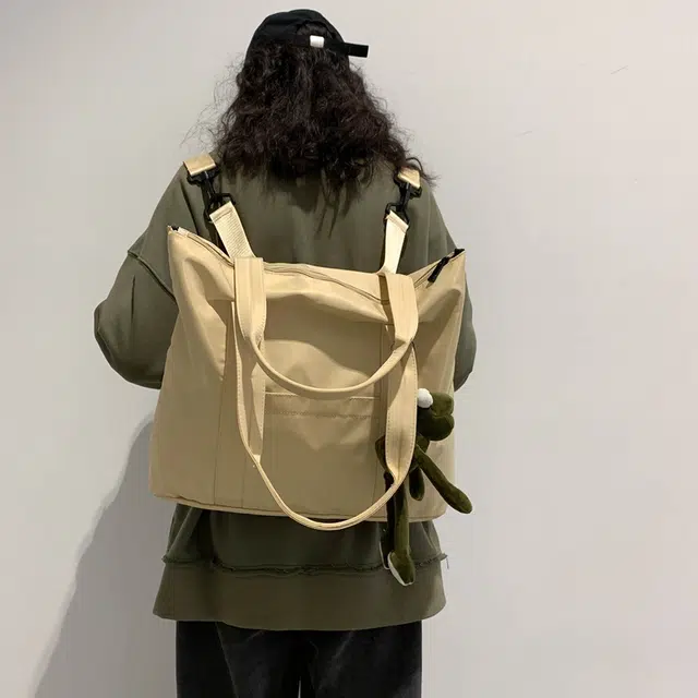班亚奴 时尚复古潮流小众设计感多功能三用百搭出行旅游轻便大容量 尼龙 双肩包手提包单肩包 男女同款情侣款 黑色/蓝色