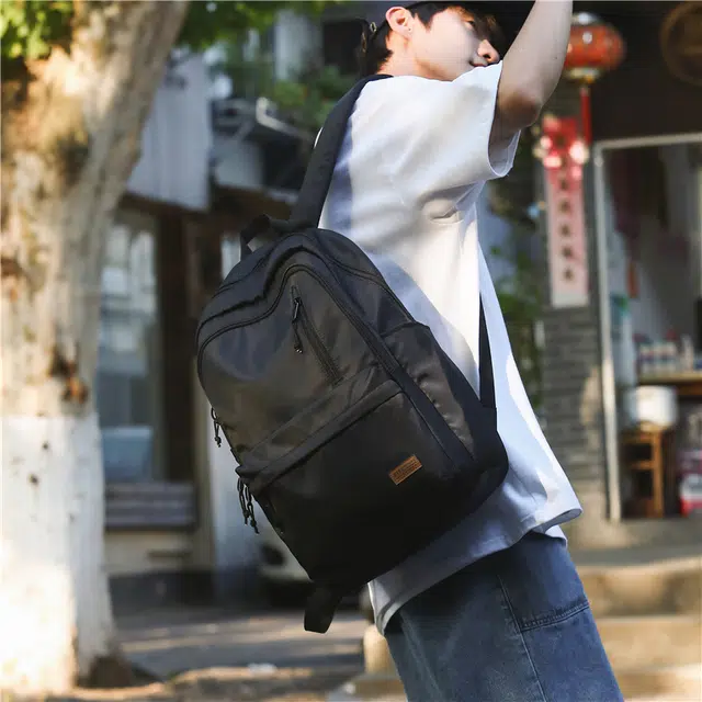 特步 商务旅行初中高中 牛津纺 双肩包 男款 黑色